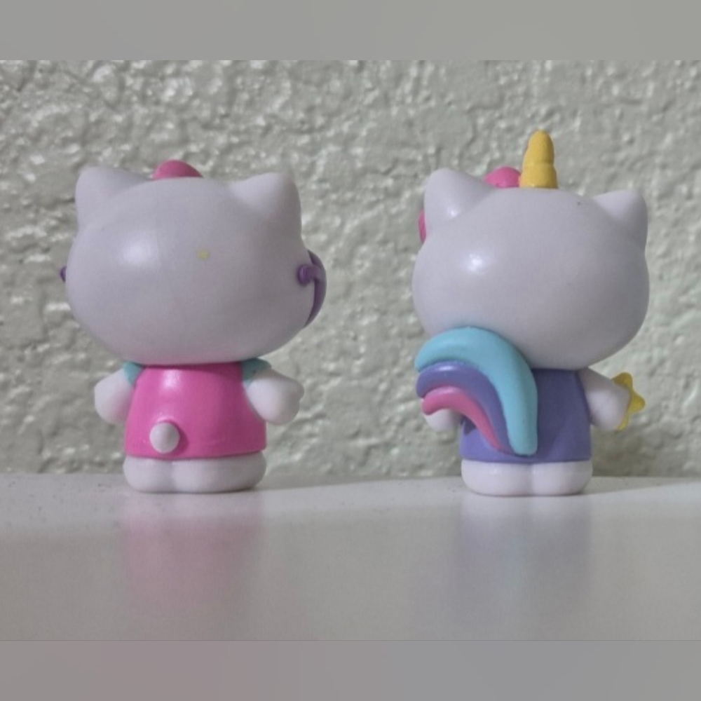 4 Hello Kitty Figurines